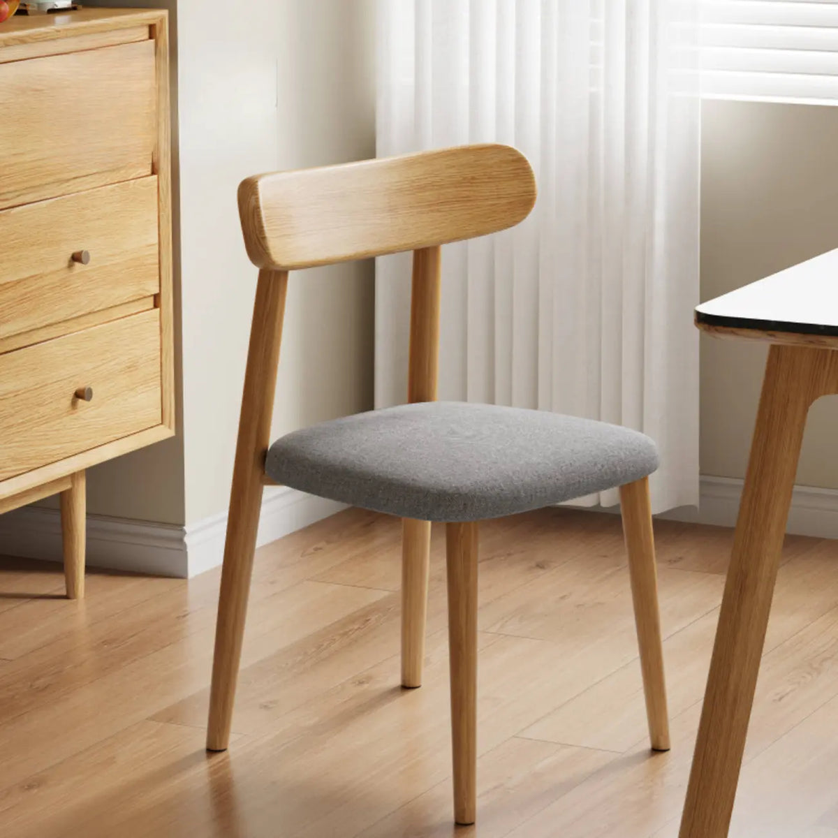 Chaise de salle à manger moderne sans accoudoirs en cuir à dossier bas