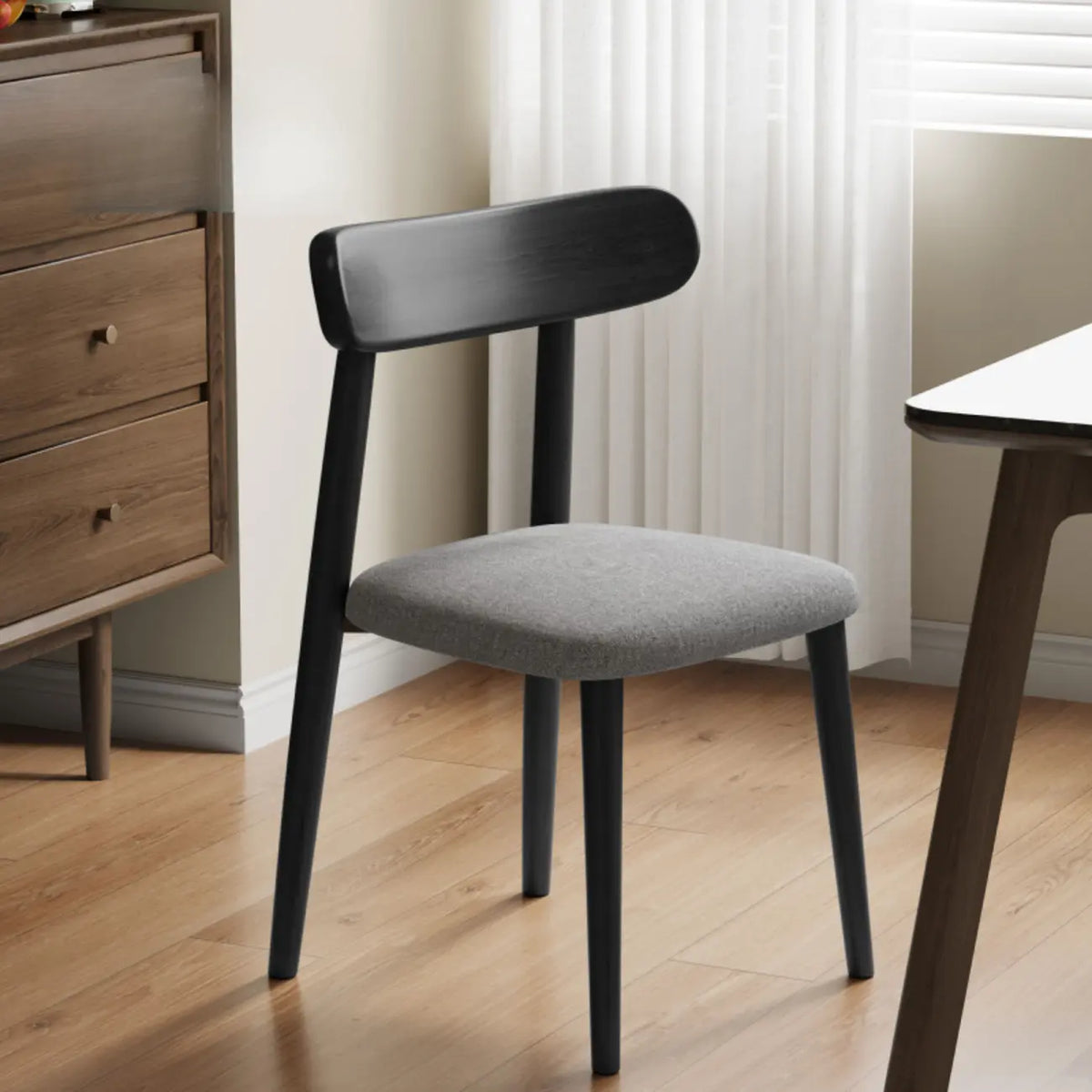 Chaise de salle à manger moderne sans accoudoirs en cuir à dossier bas