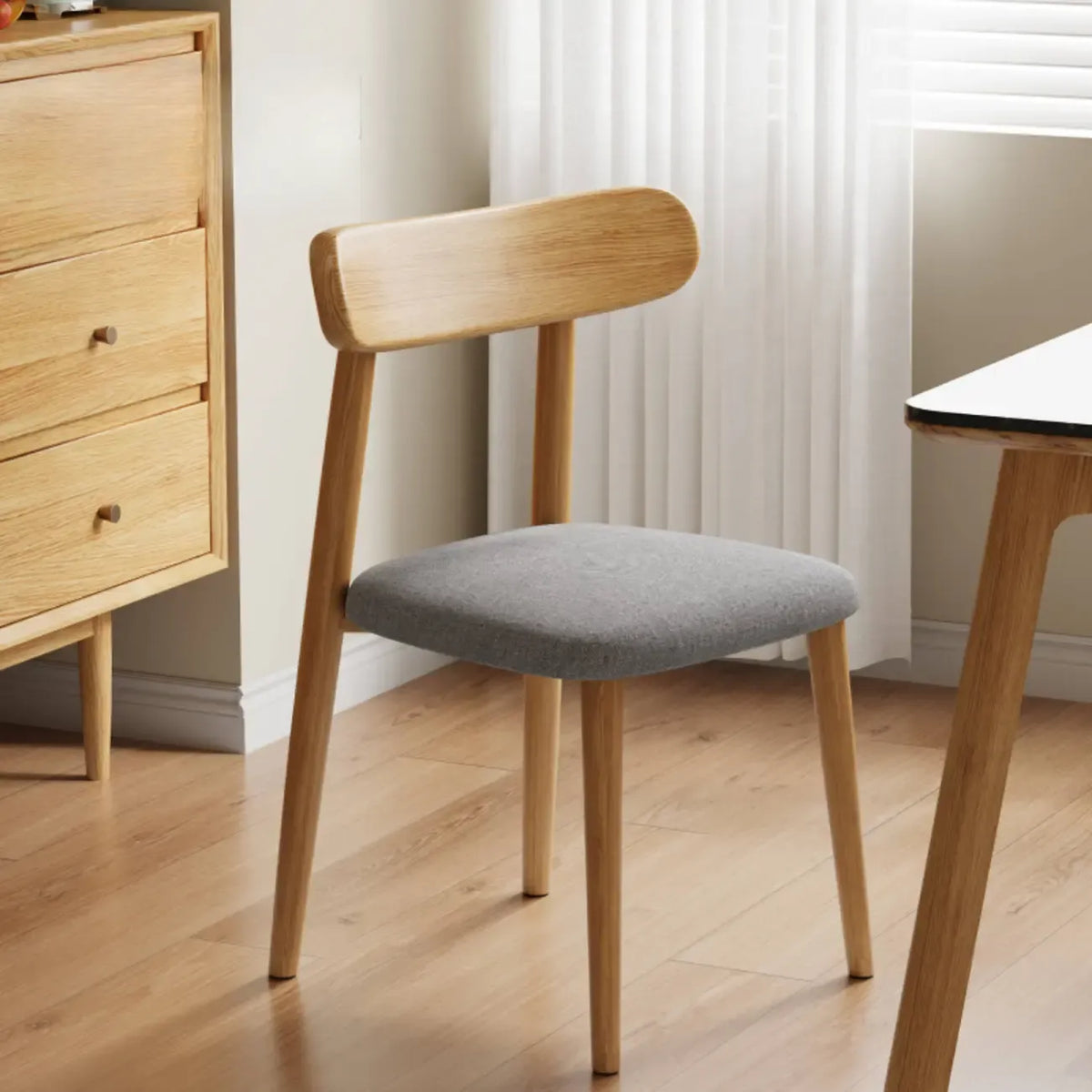Chaise de salle à manger moderne sans accoudoirs en cuir à dossier bas