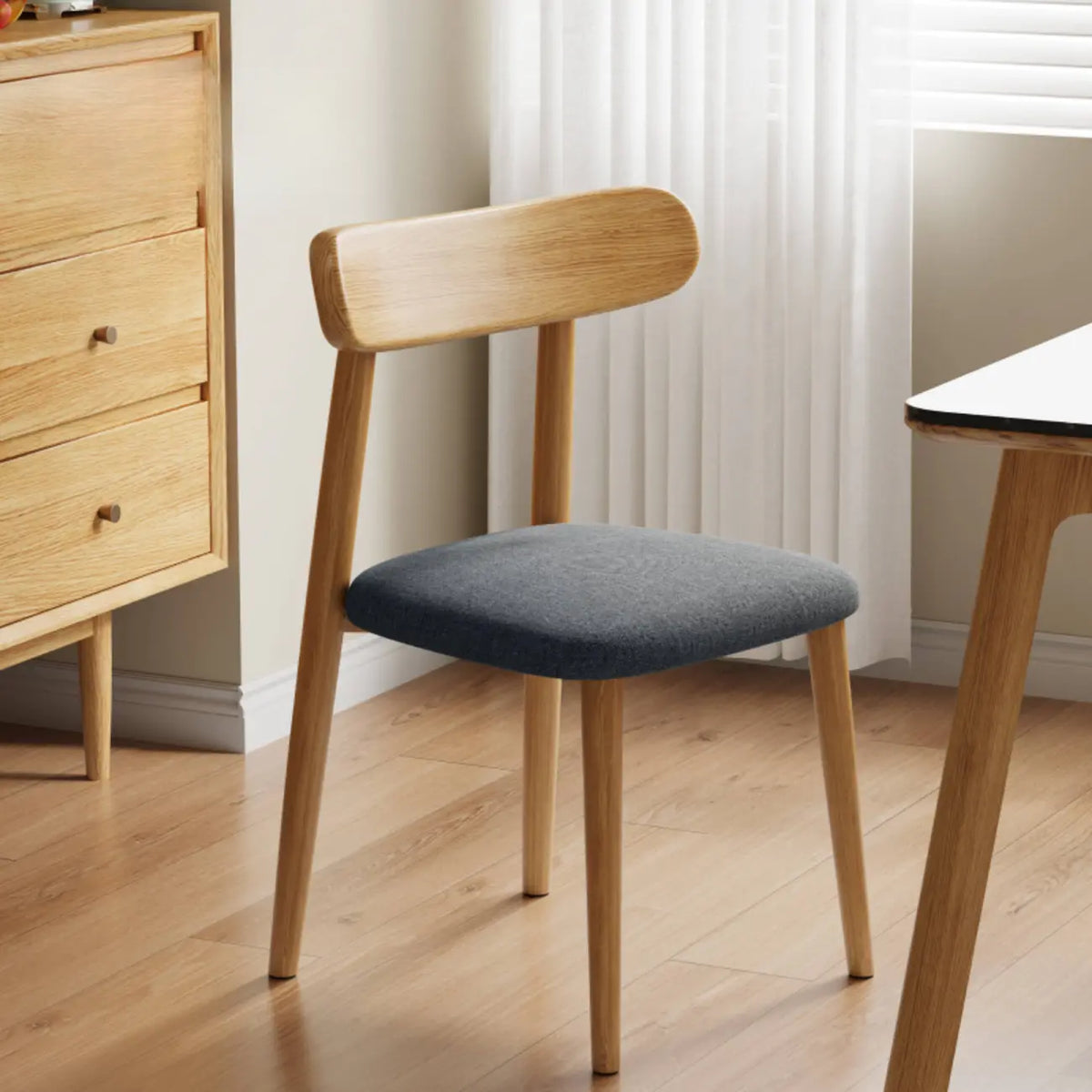 Chaise de salle à manger moderne sans accoudoirs en cuir à dossier bas