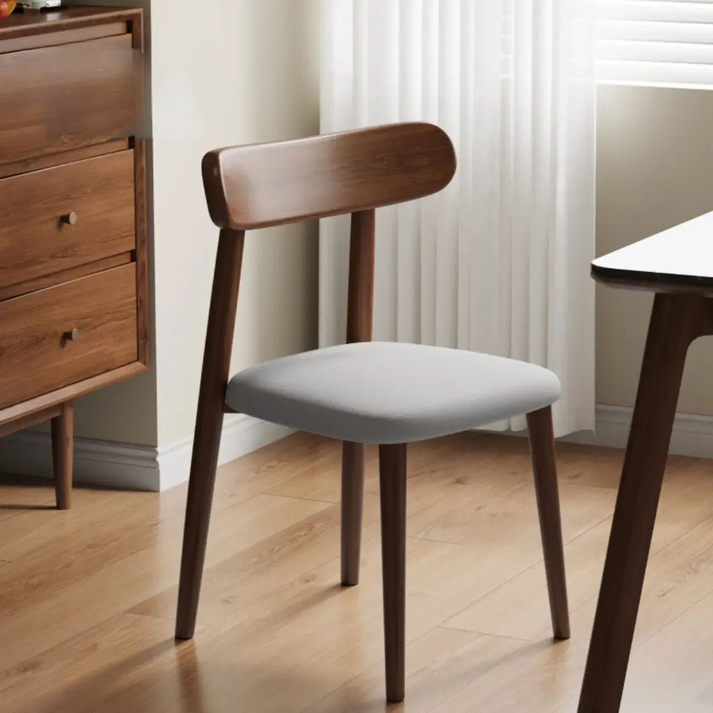 Chaise de salle à manger moderne sans accoudoirs en cuir à dossier bas