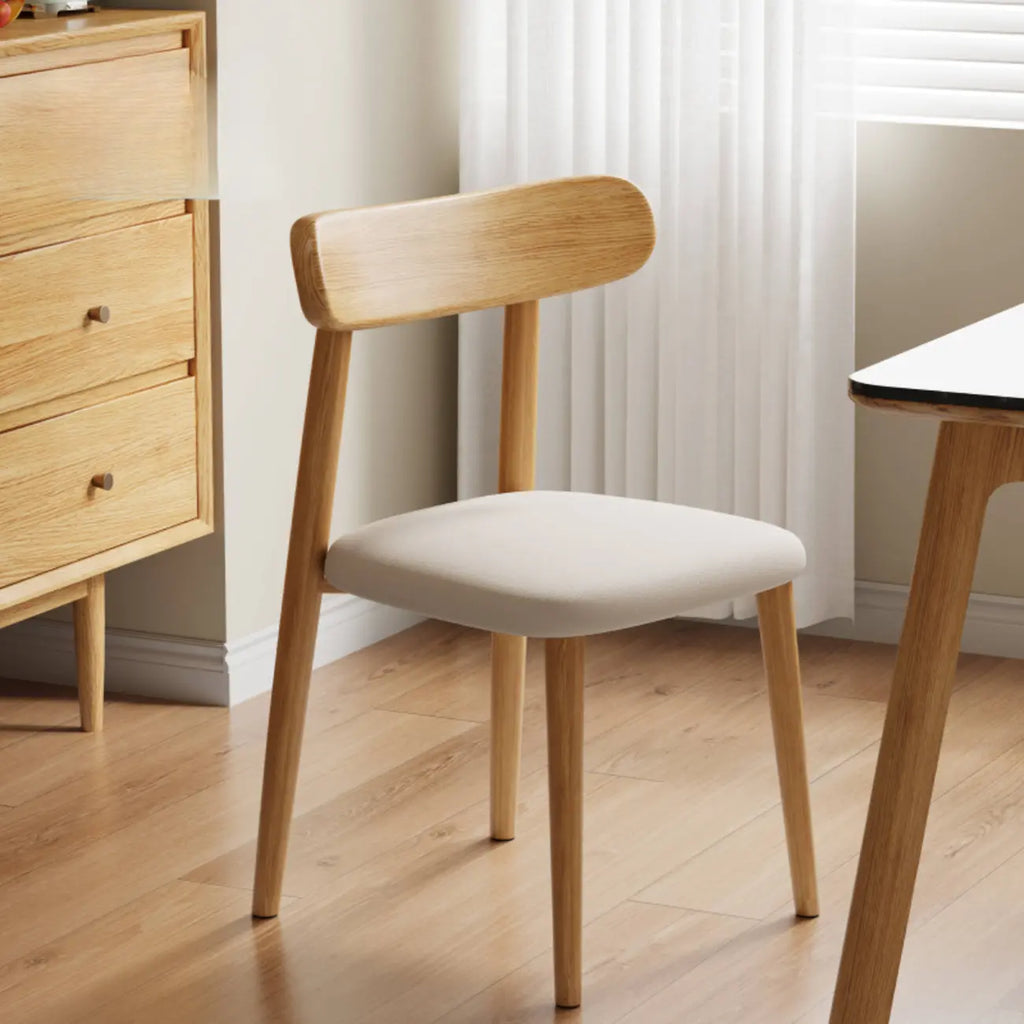 Chaise de salle à manger moderne sans accoudoirs en cuir à dossier bas